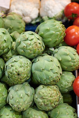 Artichokes on a market counter