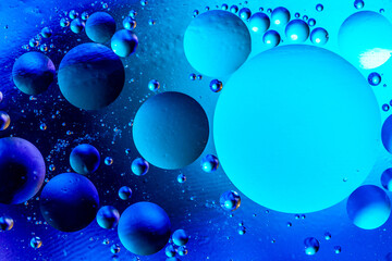 Bubbles of oxygen in water. Water structure. Blue abstract water bubbles texture background.