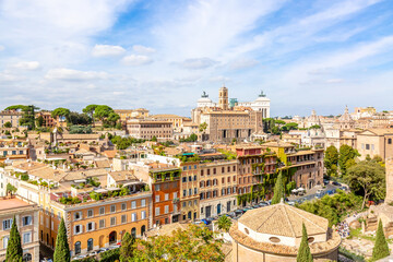 Fototapeta na wymiar Panoramic cityscape view of the Rome city center and Roman Altar of the Fatherland in Rome, Italy. World famous landmarks in Italy during summer sunny day