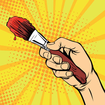 Hand with a painter brush. Drawing art vector illustration in pop art retro comic style