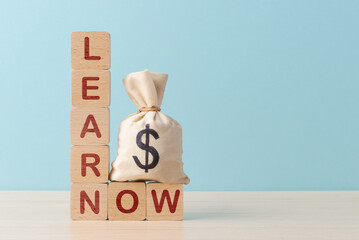 Wooden Blocks Spelling ‘LEARN NOW’ with Money Bag - 747566126