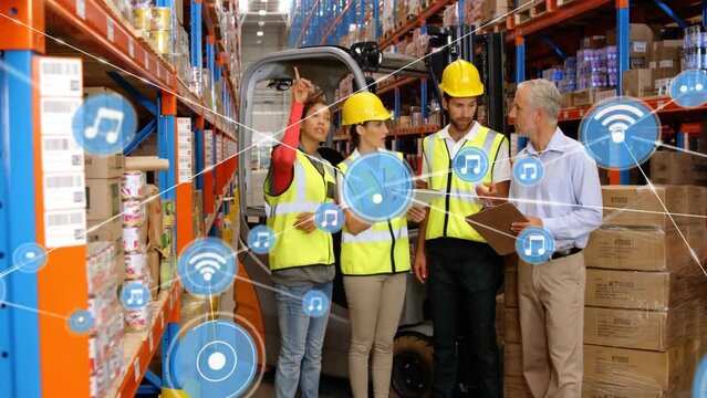 Animation of network of connections with icons over diverse workers discussing in warehouse