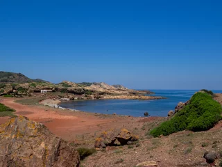 Crédence de cuisine en verre imprimé Cala Pregonda, île de Minorque, Espagne Red sand beach in north Menorca