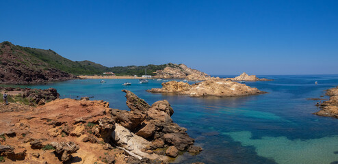 View to Cala Pregonda across the rocky bay, Menorca