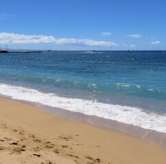 Waves crashing on Maui beach