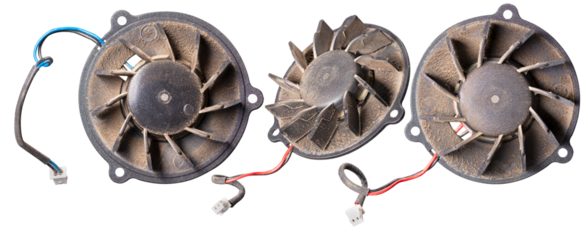 Old dirty fan used to cool the processor in a laptop.