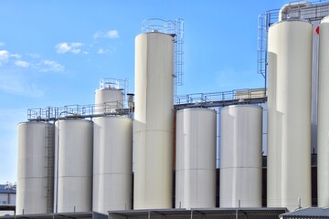 White tanks of a modern dairy plant.