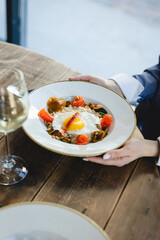 Hearty breakfast with eggs, porridge and salmon. Healthy lifestyle, lunch, brunch