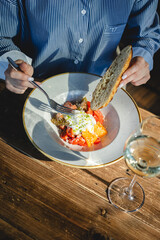 Appetizing brunch, salad with cheese. Restaurant food service, food photography.