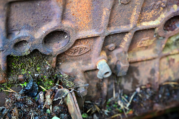 Engine of Old cars in wild nature on the Kyrko Mosse Car Cemetery, former junkyard, in the forest,...