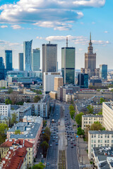 Warsaw city center, PKiN and skyscrapers under blue cloudy sky aerial landscape