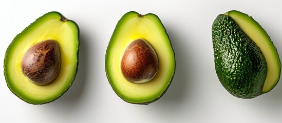 A photo featuring three avocados, one of which is cut in half, against a clean white background.
