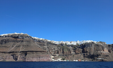 Santorini- Greece: View of the town of Fira perched on top of the caldera rim.