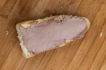 making a sandwich with chocolate-flavored cheese
