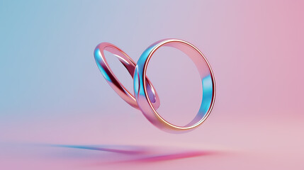 Falling two male and female wedding rings on a bright background.