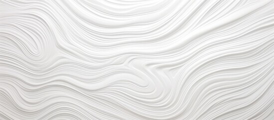 A white wall with abstract wavy lines painted on it, creating a modern and artful design. The lines twist and turn across the wall, adding a dynamic element to the space.