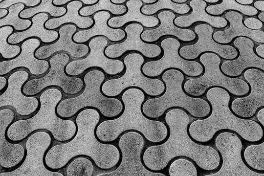 An interesting curvy texture. Black and white image of an interresting patterns. Neat clean background repetitive. 