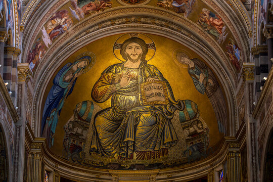 Pisa, Italy - July 30, 2023: Mosaic of Christ in majesty, in the apse of the Cathedral of Pisa, Piazza dei Miracoli