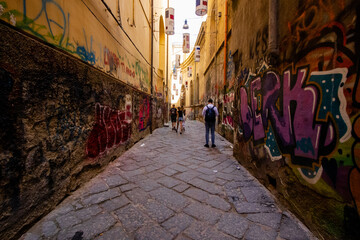 Fototapeta premium Naples, Italy The famous city of the italian south with Largo Maradona, Plebiscito Square, the gallery, Quartieri Spagnoli Spaccanapoli Vomero and the lagoon. Murales all over the town