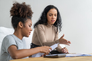 Stressed African American women has financial problems with credit card debt to pay crucial show concept of bad personal money and mortgage pay management crisis.