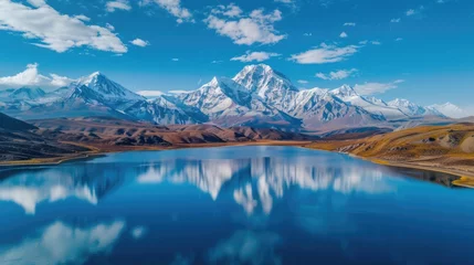 Crédence de cuisine en verre imprimé Mont Cradle Alpine Lake Reflections: Snow-Capped Mountains Mirrored in Tranquil Waters