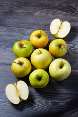 Contrast Colors; Golden apples on a rustic background
