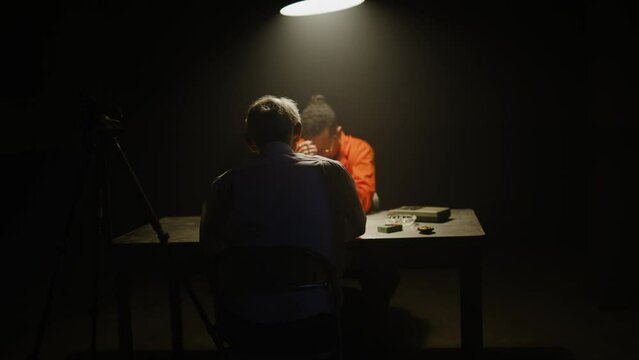Interrogation room police work with criminal