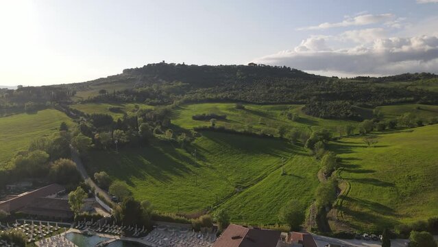 Amazing hotel resort in Tuscany region, drone flying above luxury hotel with thermal springs for physical health and mental relax