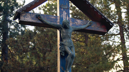 Crucified Jesus Christ In The Calabria Mountain near the forest