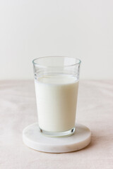 Glass of fresh milk with oatmeal cookies