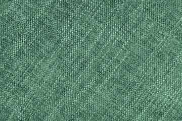 Coarse weave jacquard fabric texture background, green cloth texture. Textile background, furniture...