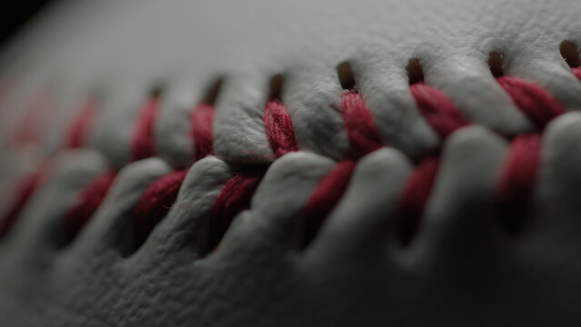 Dramatic, cinematic macro texture shots of a baseball