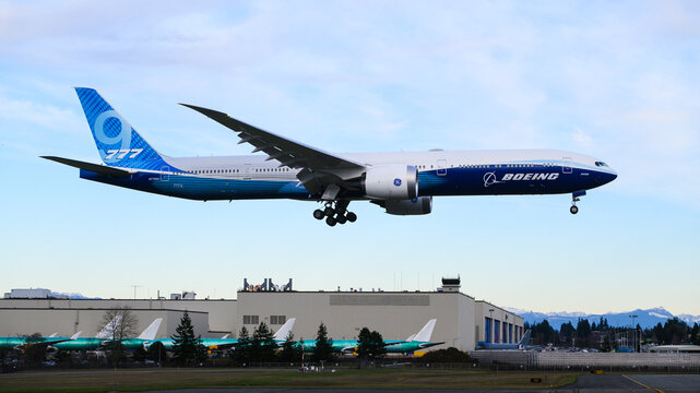 Everett, WA, USA - February 16, 2024; Boeing 777-9 prototype 777X  aircraft landing at Boeing Everett factory