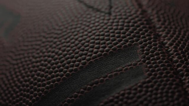Dramatic, cinematic macro texture shots of a football