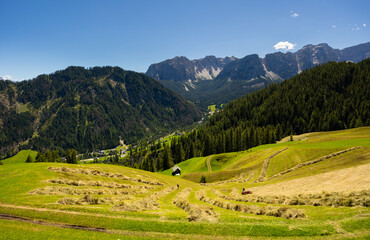 Hiking through Dolomite Mountains is surreal experience, surrounded by jagged peaks and serene landscapes.