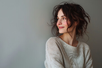 Captivating Portrait of a Young Woman in a Cozy Sweater, Embracing a Moment of Serene Joy
