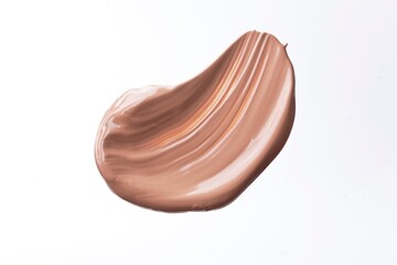 Close up of a foundation smear isolated on a white background