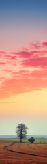 Naklejka na ściany i meble Capture the essence of a peaceful countryside sunset with pastel hues.