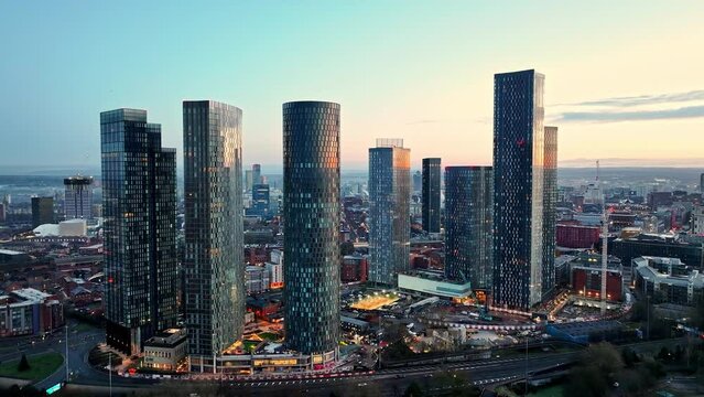 Aerial of Deansgate Square Manchester UK in the blue zone just before sunrise.