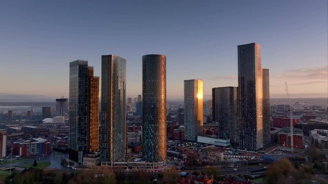 Aerial of Deansgate Square Manchester UK in the blue zone just before sunrise.