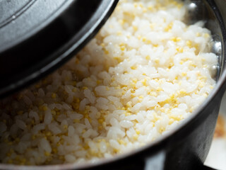 glutinous millet rice in a cauldron 