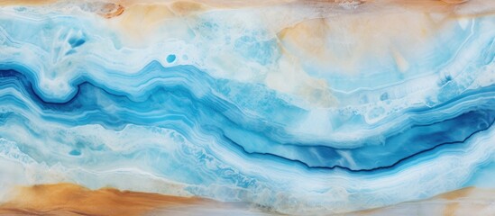 A vibrant abstract painting featuring waves in shades of blue and brown, creating a dynamic and flowing composition. The colors blend and swirl together, reminiscent of the movement of water.