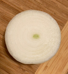 Fototapeta na wymiar onion on a wooden board