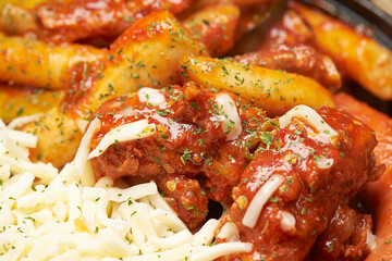 Spicy chicken ribs on an iron plate