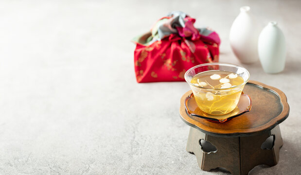 Warm ginseng tea on a traditional table