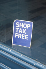 shop tax free text duty free shop sign on shop window 