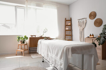 Interior of spa salon with couch and ladder