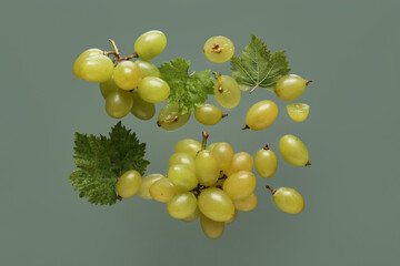 Fresh green grapes with leaves on color background