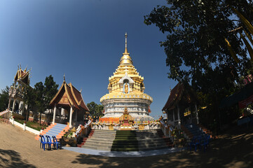 The large golden pagoda, which contains the sacred hair and relics of the Lord Buddha, is approximately 1,000 years old. That is revered and worshiped by Thai Buddhists at Wat Phra That Doi Saket.