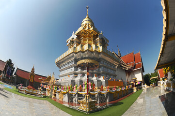 The large golden pagoda, which contains the sacred hair and relics of the Lord Buddha, is...